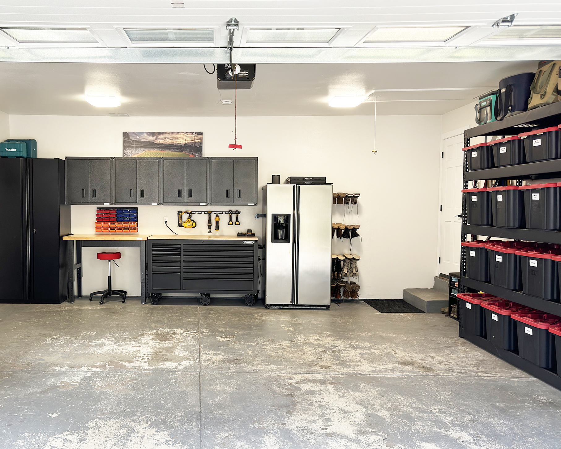 Garage makeover with gladiator steel cabinets, husky workbench, storage cabinet and shelving