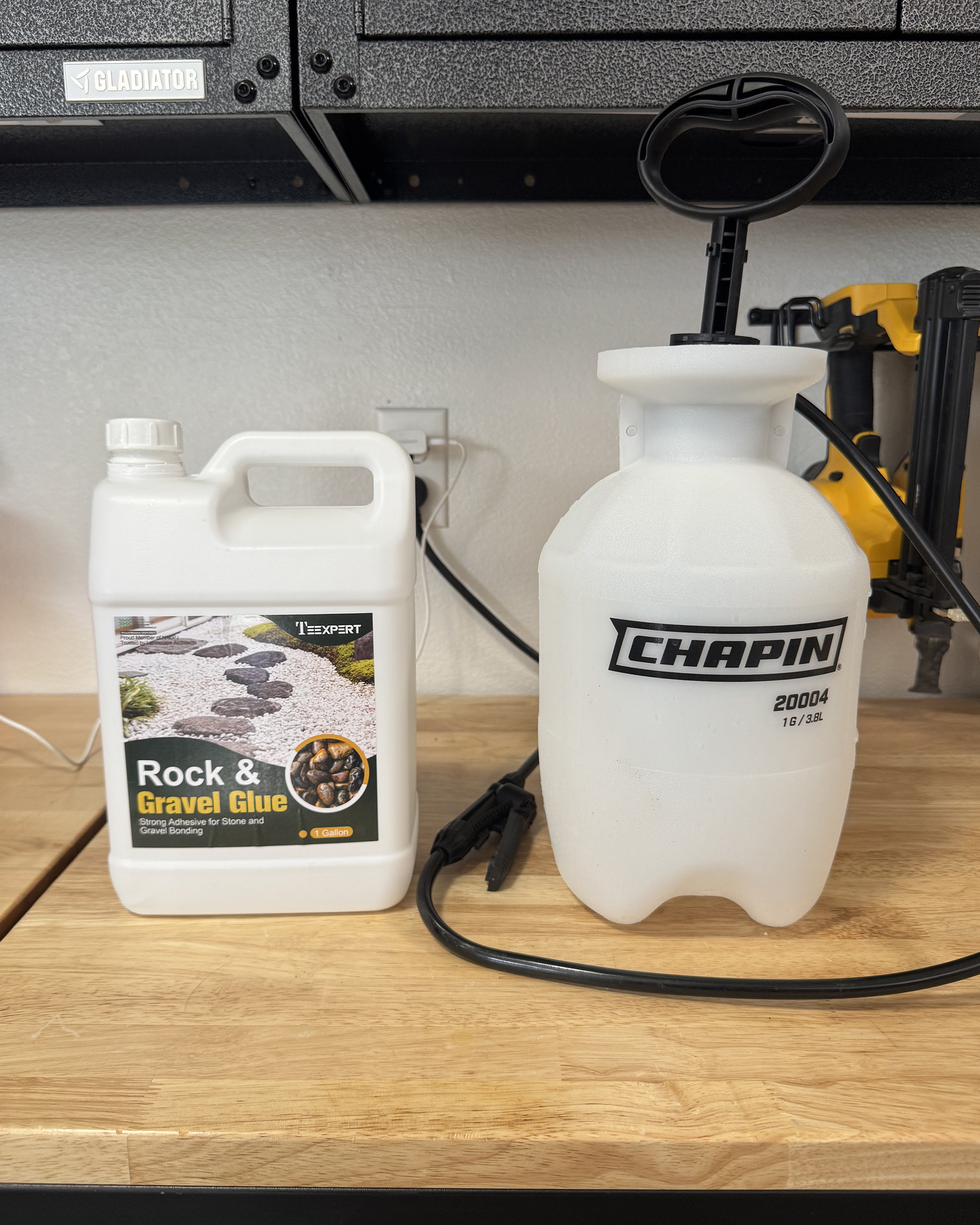 1 gallon of rock & gravel glue and garden pump sprayer used for pea gravel project