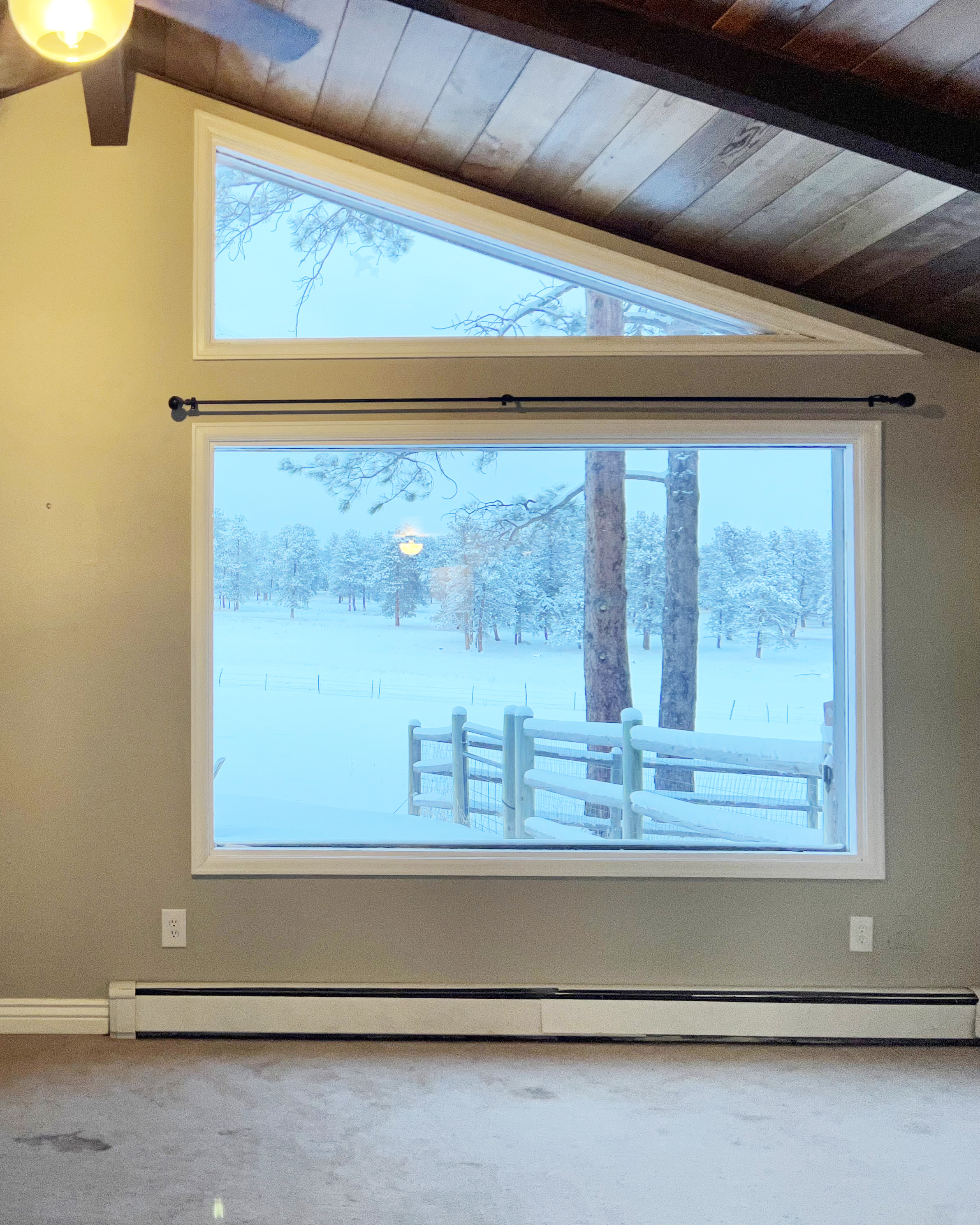 Old baseboard heaters in master bedroom