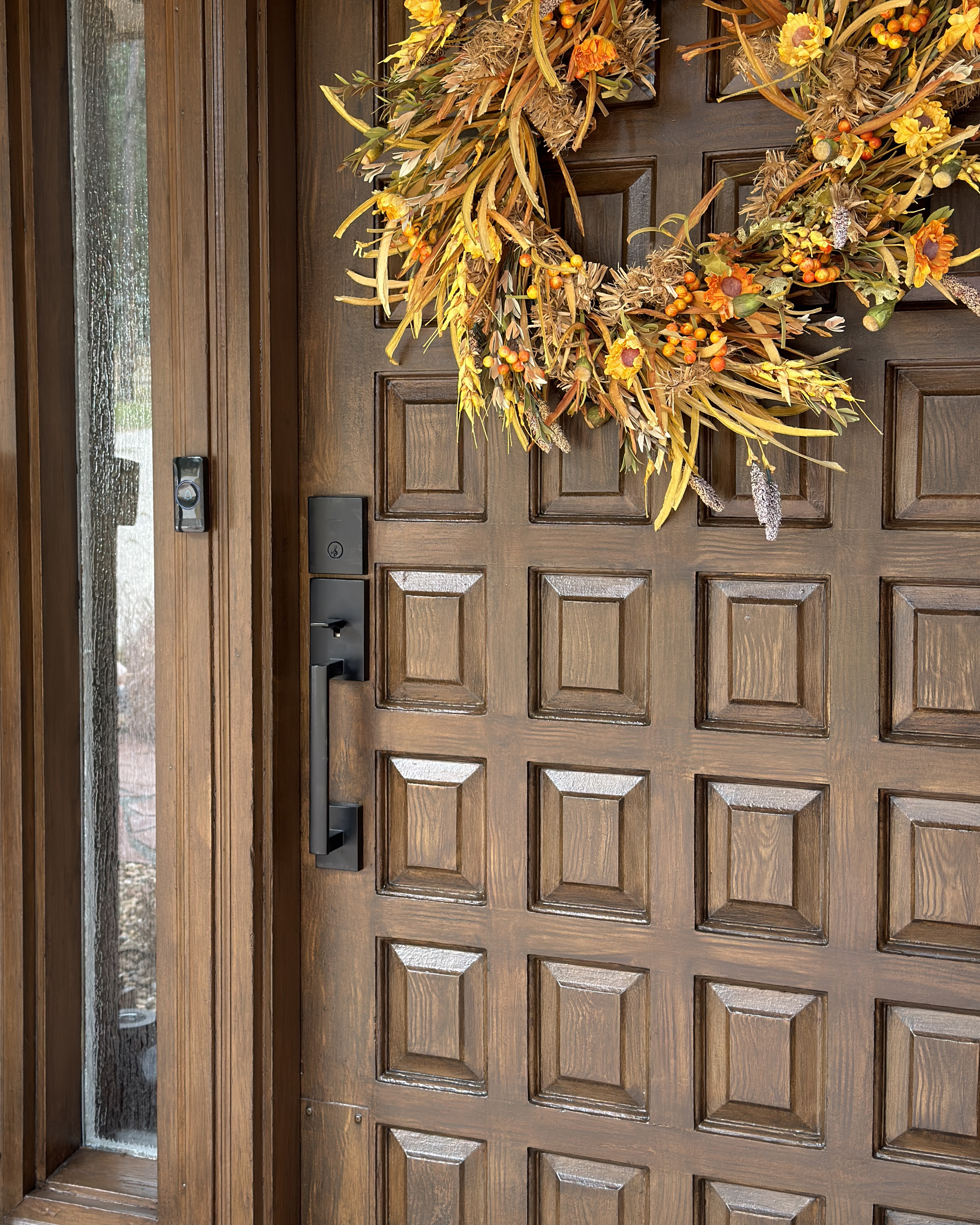 Faux wood front door makeover using Retique It liquid wood in dark oak, closeup